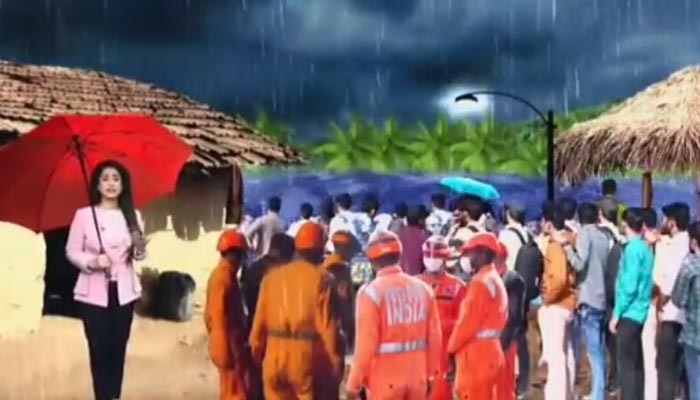 A screengrab of an Indian channel where a reporter is updating the people about cyclone Biparjoy. — Twitter/@SaketGokhale