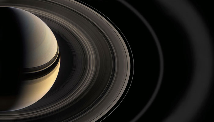 This Cassini image from 2012 shows Titan and its host planet Saturn. NASA/JPL-Caltech/File
