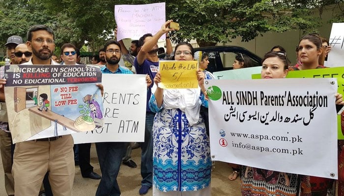 Parents protests against fee hike in Karachis private schools. — Photo by author