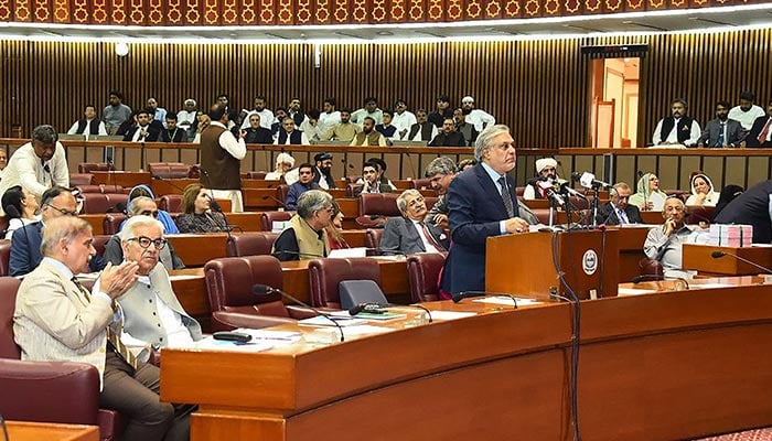 Finance Minister Ishaq Dar presenting the budget 2023-2024 at the National Assembly in Islamabad. — AFP