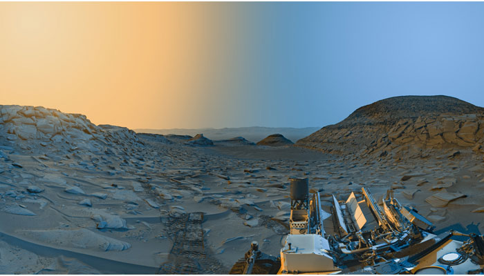 Nasas Curiosity Mars rover used its black-and-white navigation cameras to capture panoramas of “Marker Band Valley” at two times of day on April 8, 2023. — Nasa