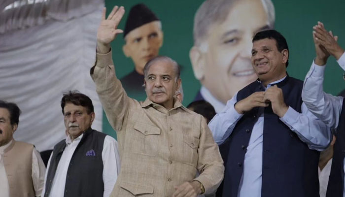 Prime Minister Shehbaz Sharif waves to PML-N workers during the Central General Council meeting held in Islamabad. — Twitter/@pmln_org