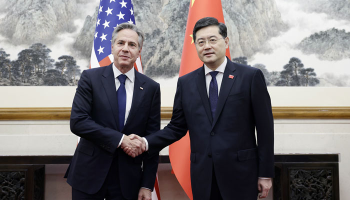 Secretary of State Antony Blinken (left) while shaking hands with Chinese Foreign Minister Qin Gang at the door to a villa on the grounds of Beijings Diaoyutai State Guest House on June 18, 2023. — Twitter/@spokespersonCHN