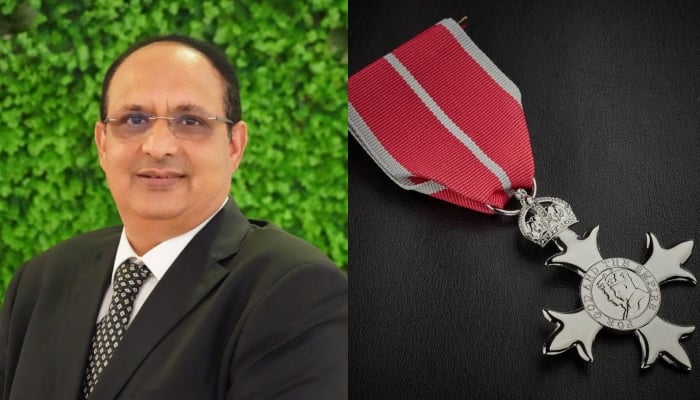 British Pakistani charity worker Ehsan Shahid Choudhry (left) receivesBritish Empire Medal (BEM) medal. — Provided by the reporter