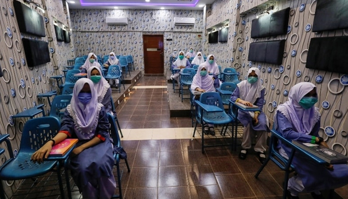 Students keep safe distance while attending an audio-visual class in Karachi on September 15. — Reuters