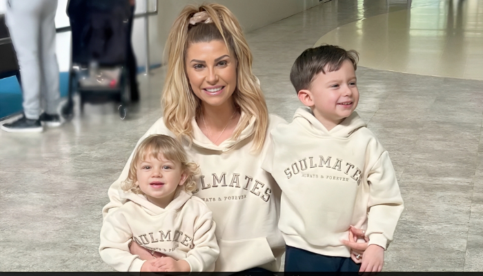 The doting mom shared two pictures of her toddler updating her followers that he was released from the hospital