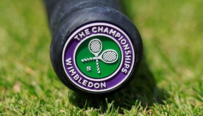 Tennis - Wimbledon - All England Lawn Tennis and Croquet Club, London, Britain - July 2, 2019, General view of the Wimbledon logo on the base of the handle of a tennis racquet.—Reuters