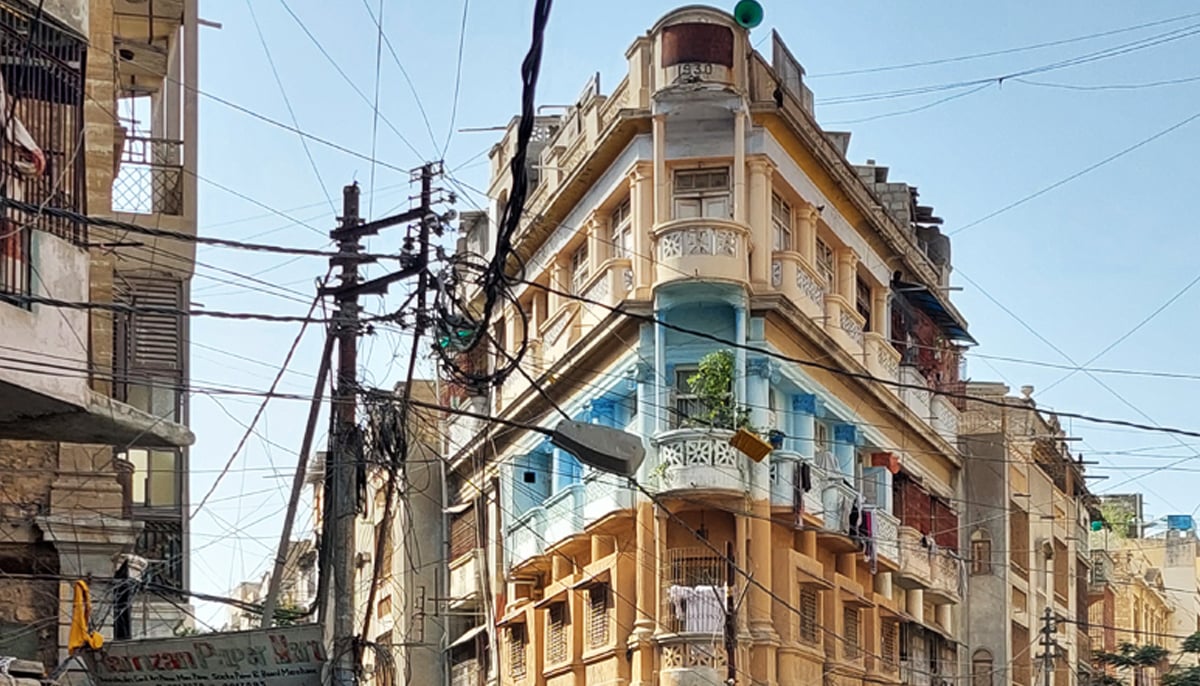 An old building, with the year 1930 written on top, in Karachi. — Photo by author