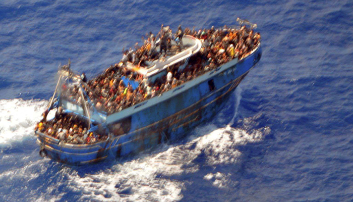 A undated handout photo provided by the Hellenic Coast Guard shows migrants onboard a boat during a rescue operation, before their boat capsized on the open sea, off Greece, June 14, 2023. — Reuters