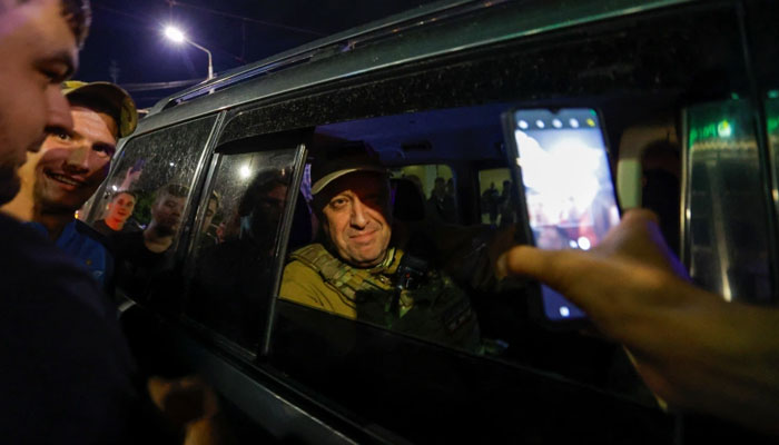 Prigozhin took pictures with local residents as he left Rostov. — Reuters