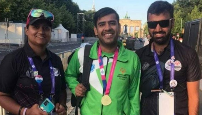Safeer Abid (Centre) bagged the gold medal after he won cycling competition in Germany. — Author