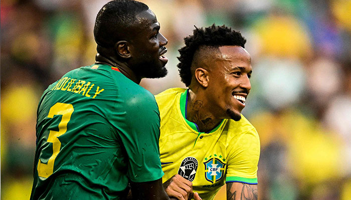 Senegal´s defender Kalidou Koulibaly (L) greets Brazil´s defender Eder Militao during the international friendly football match between Brazil and Senegal at the Jose Alvalade stadium in Lisbon on June 20, 2023.—AFP