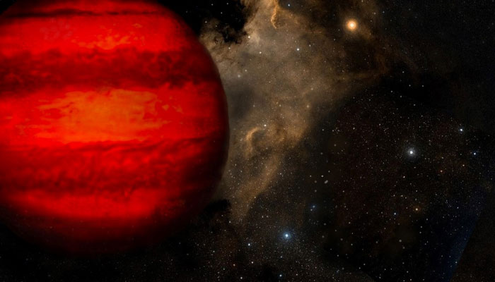 This is an illustration of a brown dwarf that would appear magenta or orange-red to the human eye if seen close up. — Nasa