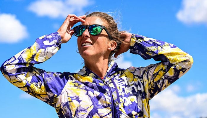 Dauwalter poses for a photo during a run near Twin Lakes, Colorado, in May.—AFP