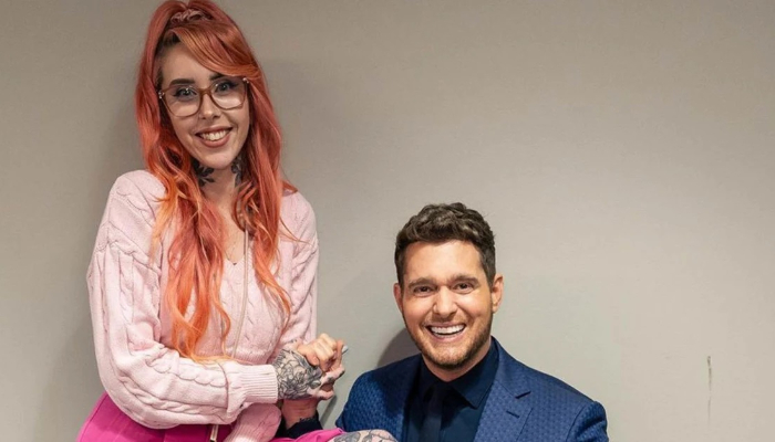 Canadian singer Michael Buble is mighty impressed by fan who tattooed his face on her leg