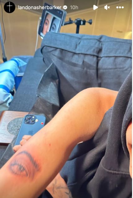 Charli D’Amelio secures Landon Barkers tattoo through rock, paper, scissors