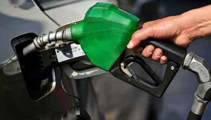 Petrol is being added in a car. — AFP/File