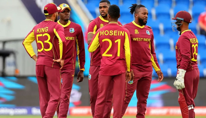 In this undated photo West Indian players can be seen discussing a matter during a match. — AFP/File