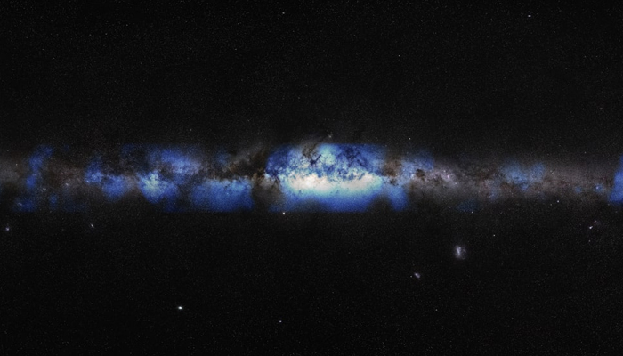 An artist’s composition of the Milky Way is seen through a neutrino lens (blue) in this picture released on June 29, 2023. — The IceCube Neutrino Observatory/NSF