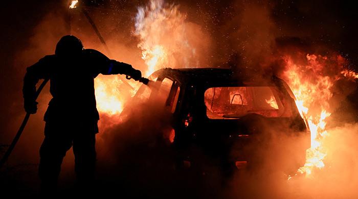 Sporadic violence, but calmer night in France after family buries teenager
