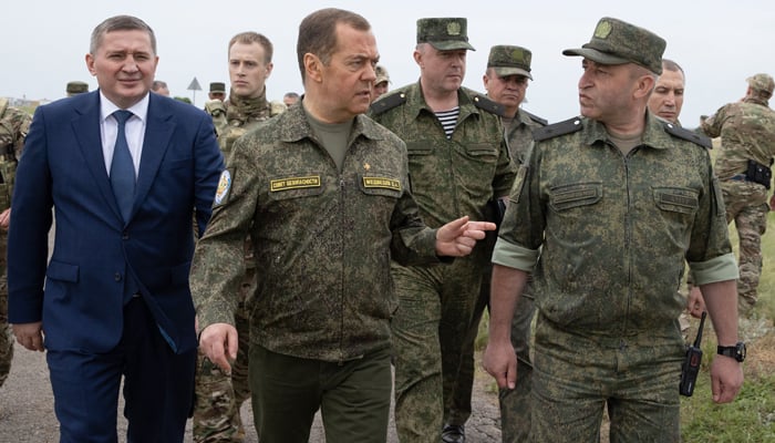 Russias former leader Dmitry Medvedev, a President Putin ally visits the Prudboy range in the Volgograd region, southern Russia, on June 1, 2023. — AFP
