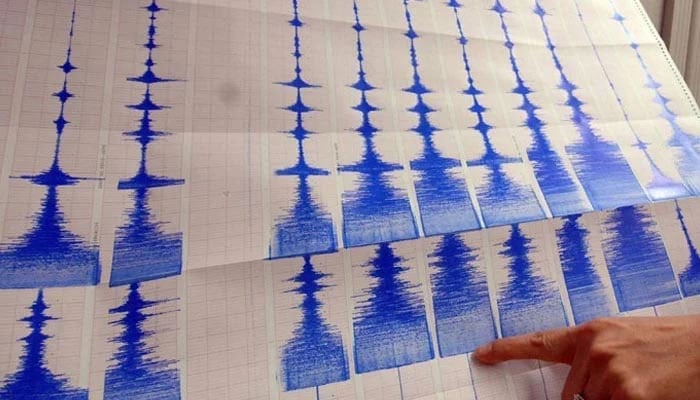 A seismograph takes readings of an earthquake.