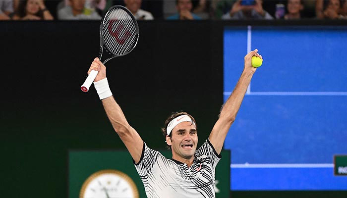 In this file photo taken on January 29, 2017 Switzerland´s Roger Federer celebrates his victory against Spain´s Rafael Nadal during the men´s singles final on day 14 of the Australian Open tennis tournament in Melbourne. — AFP/File