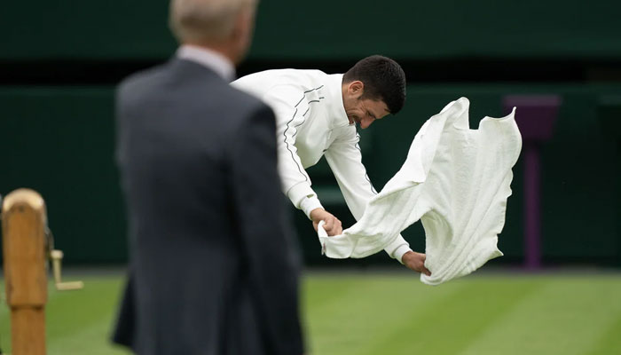 Djokovic tried to aid a speedy resumption of the match.—Reuters
