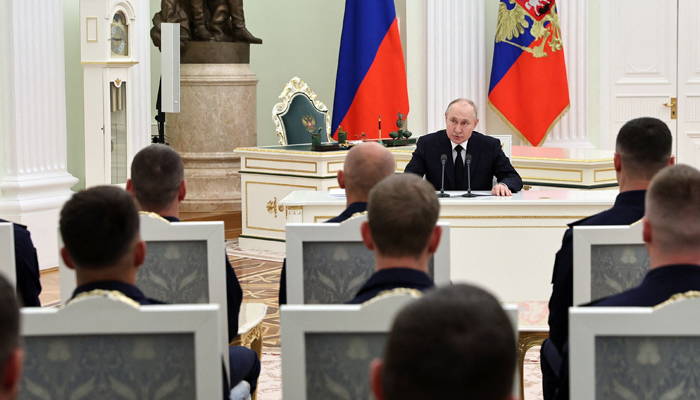 Russian President Vladimir Putin meets with servicemen at the Kremlin in Moscow on June 27, 2023. — AFP