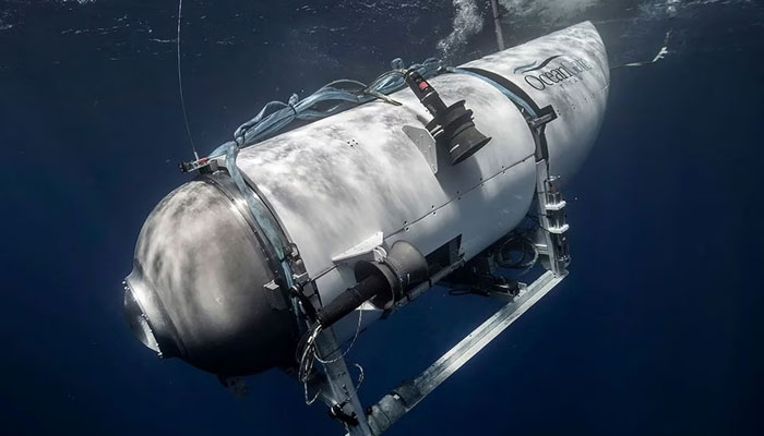 OceanGates Submersible Titan can be seen diving into the ocean. — OnceanGate Expedition