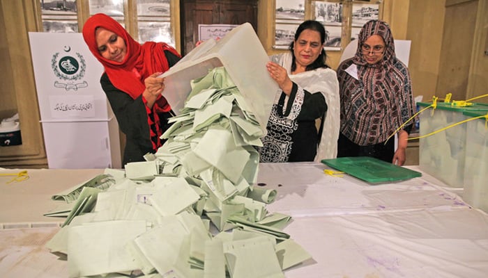 In this file photo, election officials count ballots after polls closed during the general election in Islamabad, Pakistan, July 25, 2018. — Reuters