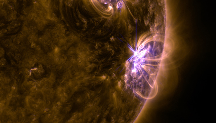 NASA’s Solar Dynamics Observatory captured this image of an M8.1 solar flare – as seen in the bright area on the right – on Sept. 8, 2017. The image is a blend of extreme ultraviolet light in the 131 and 171-angstrom wavelengths. — NASA
