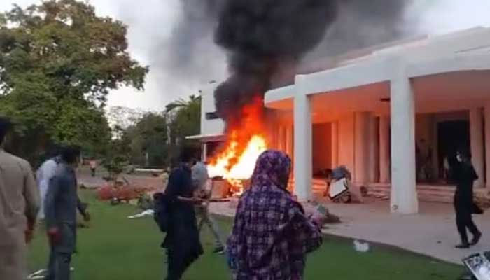 Violent protesters barge into the Jinnah House following arrest of PTI Chairman Imran Khan in Islamabad on May 9, 2023. — Twitter/Screengrab