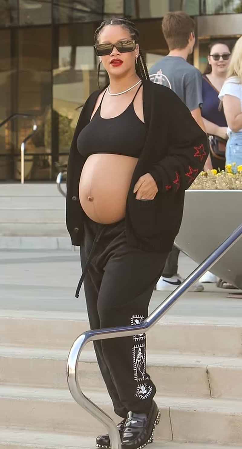 Rihanna puts her baby bump on display while out in LA