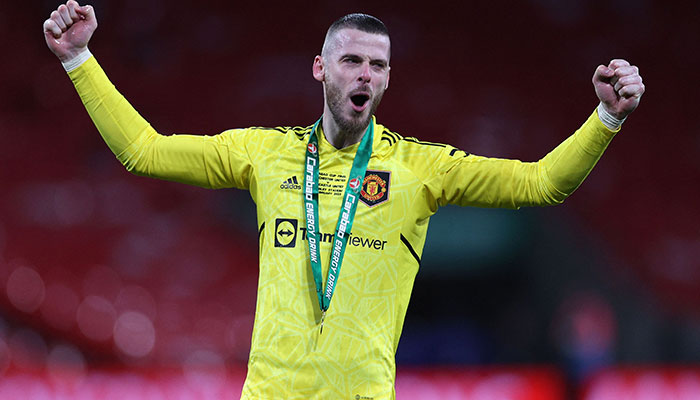 (FILES) Manchester United´s Spanish goalkeeper David de Gea celebrates after their victory in the English League Cup final football match between Manchester United and Newcastle United at Wembley Stadium, north-west London on February 26, 2023.—AFP