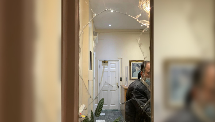 A photo of the damaged window of the Pakistan High Commission in London. — Photo by author