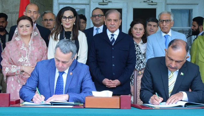 PM Shehbaz Sharif witnessing signing of MoU between Pakistan and Switzerland in Nathiagali on July 8, 2023. — AFP