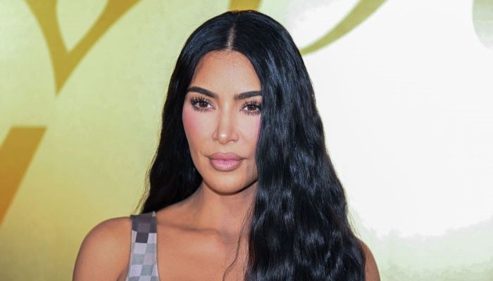 Kim Kardashian stuns in pink sheer ensemble on the beach
