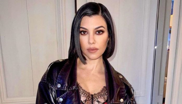 Kourtney Kardashian is embracing her pregnancy with style and humor