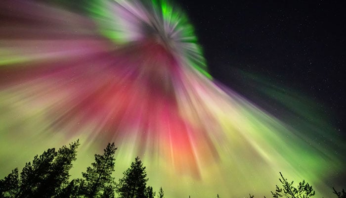 Picture taken on late March 23, 2023, shows colourful northern lights (Aurora borealis) appearing around the Arctic Circle near Rovaniemi, Finland. — AFP