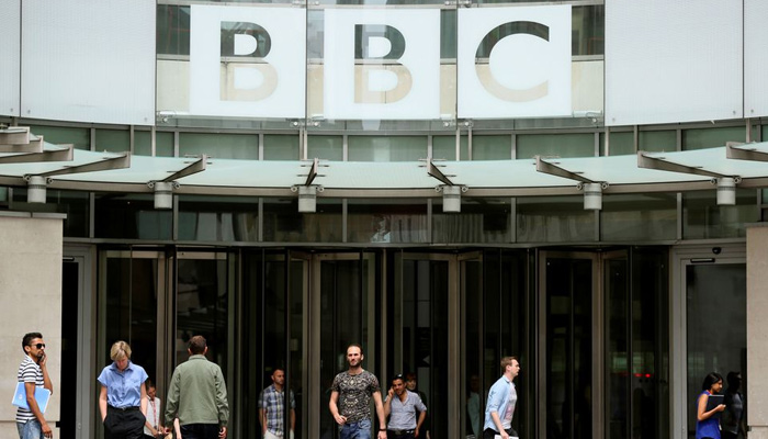 People arrive and depart from Broadcasting House, the headquarters of the BBC, in London Britain July 2, 2015. — Reuters