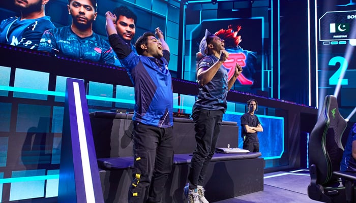 Pakistans Tekken players celebrate after beating South Korea — Twitter @Gamers8GG