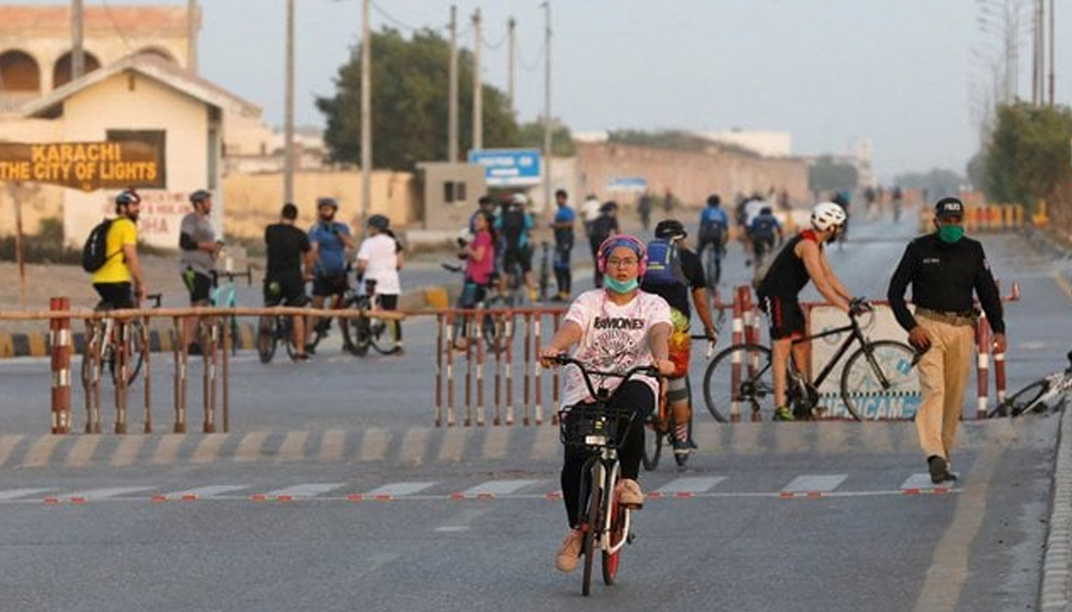A woman cycles on Karachi streets during the COVID-19 lockdown days— Reuters/File