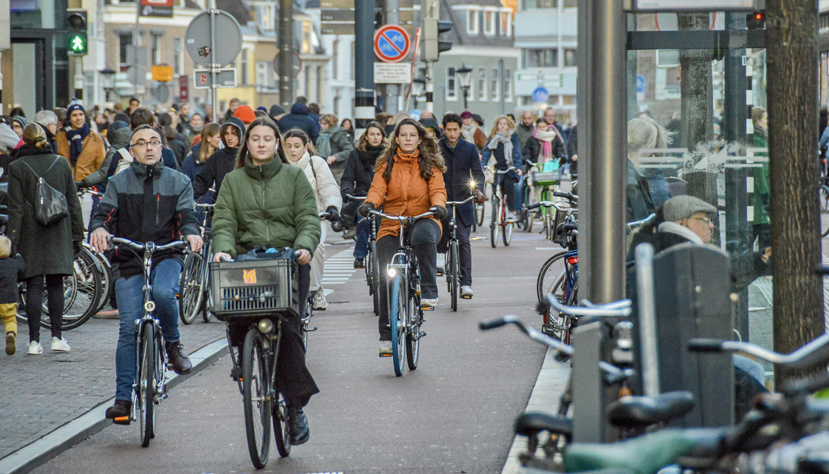 Residents cycle on streets of Vredenburg in the Netherlands Utrecht province. — Dutch Cycling Embassy