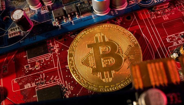 A representation of cryptocurrency Bitcoin is placed on a PC motherboard, in this illustration taken June 16, 2023. — Reuters