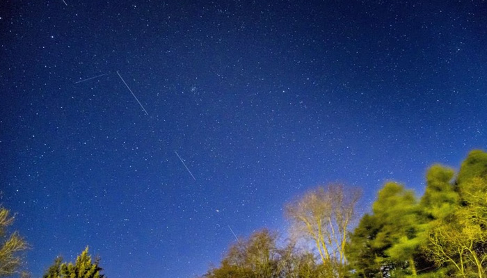 Elon Musks company SpaceX Starlink 5 satellites are pictured in the sky seen from Svendborg on South Funen, Denmark April 21, 2020. — Reuters