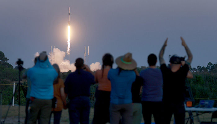 People watch as a SpaceX Falcon 9 rocket lifts off from launch pad 40 at Cape Canaveral Space Force Station on February 27, 2023 in Cape Canaveral, Florida. — AFP