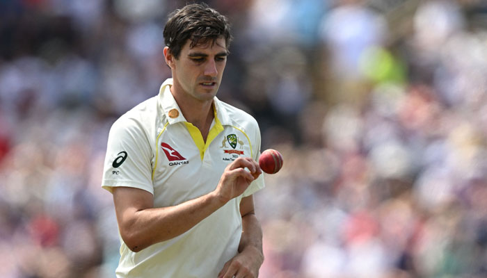 Australias Pat Cummins prepares to bowl on day four of the third Ashes cricket Test match between England and Australia at Headingley cricket ground in Leeds, northern England on July 9, 2023. — AFP