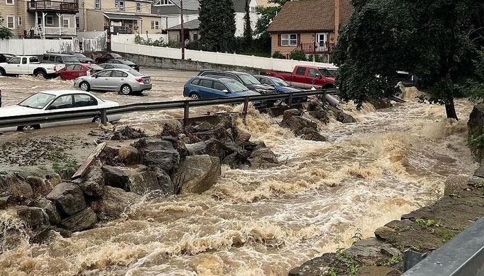 Flooding surrounds a parking lot, in Highland Falls, Orange County, New York, US The rain has passed the Empire State but the damage is widespread. Reuters