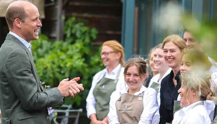 Prince William cuts ribbon of new restaurant and atrium with sweet twins